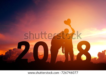 Silhouette young couple Happy for 2018 new year Royalty-Free Stock Photo #726746077