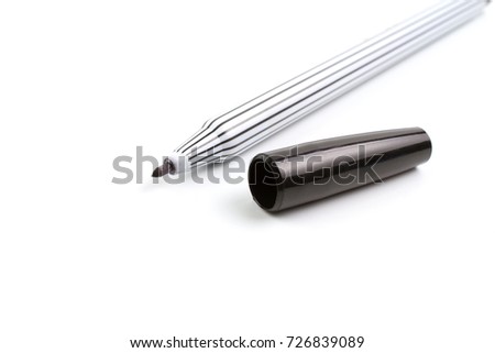 Black chemical or markers pen  removable cap and striped on the handle isolated on white background.