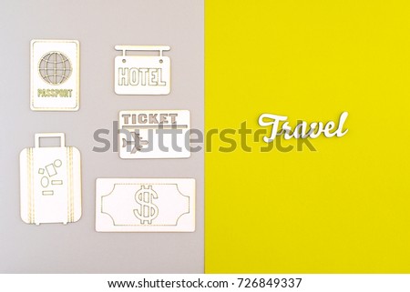 Travel icons on gray and vivid yellow colors background. Inspirational journey concept