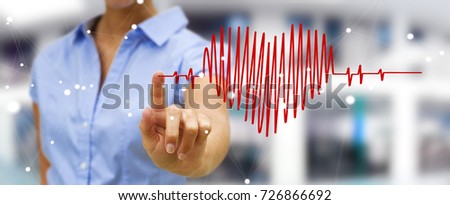 Businessman on blurred background touching and holding heart beat sketch