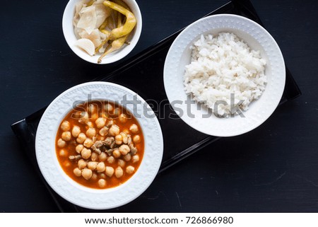 Chickpea meal with meat ,rice and pickles