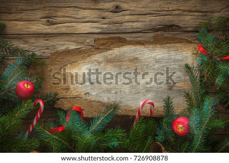 New year. Holiday greeting card with rustic wood and ornaments. Xmas backgroud.