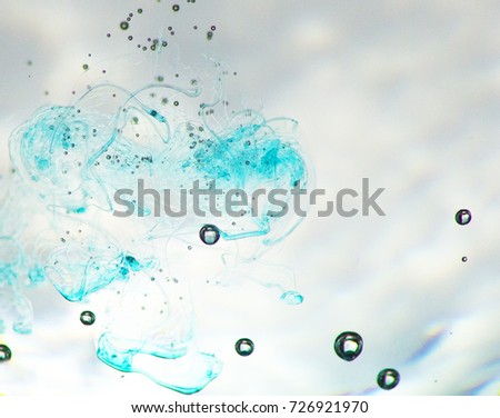 Sparkling water with blue curaçao