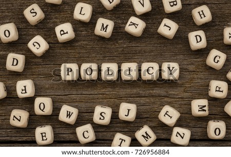 Word POLICY written on wood block,stock image