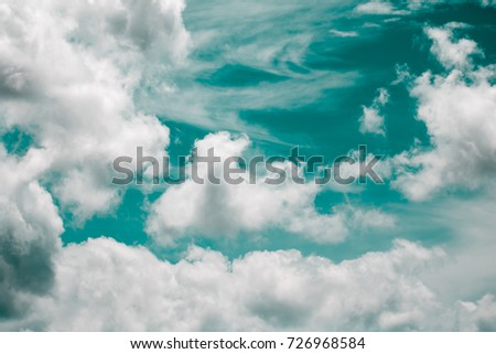 Colorful sky,green and soft clouds for background and postcard.Abstract and pastel color.
