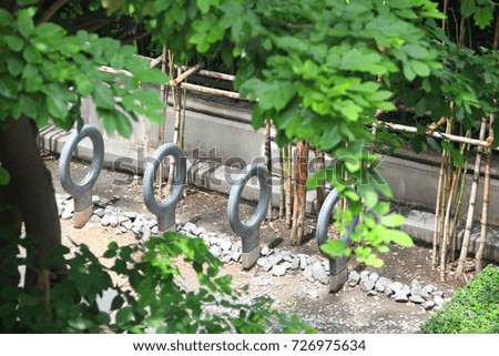 Bicycle parking lot in green garden