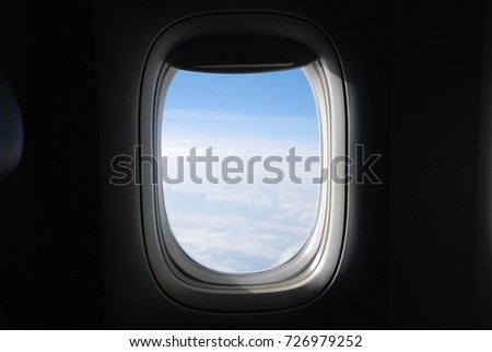 Window View From Passenger Seat On Commercial Airplane Royalty-Free Stock Photo #726979252