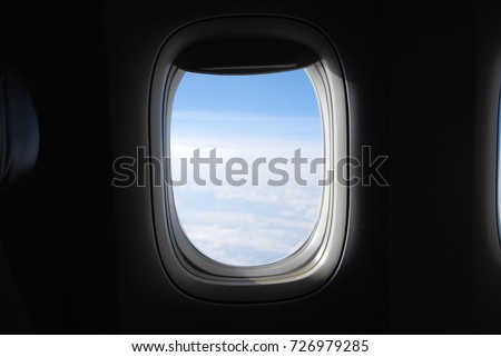 Window View From Passenger Seat On Commercial Airplane Royalty-Free Stock Photo #726979285