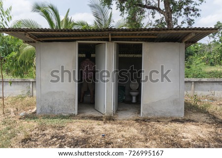Old public toilet outdoors