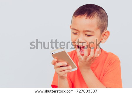 Little boy with smartphone. technology, internet communication and people concept.