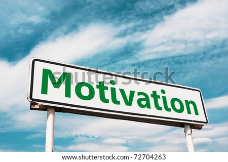 Motivation road sign against a background of blue sky with clouds