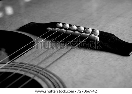 Close Up shot photo of Classic acoustic guitar with filter effect retro vintage style