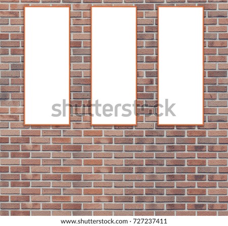 Three blank advertising billboards on brick wall, mock up, can be used for products display or your artwork in gallery or exhibition
