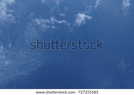 Blue sky and clouds background.