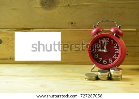 Red clock with coin and texture Business design idea concept background wood with Light soft coin step three