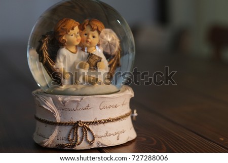 snow dome with angels for the new year
