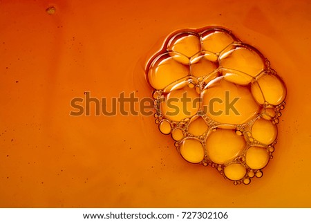 Colorful water bubbles on water as a background