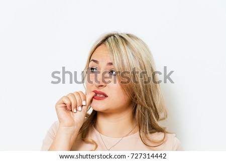 Woman bites his nails