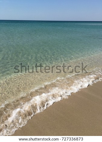 Summer photo, transparent turquoise water and white sand on the beach, Vacation, vacation, tourism.