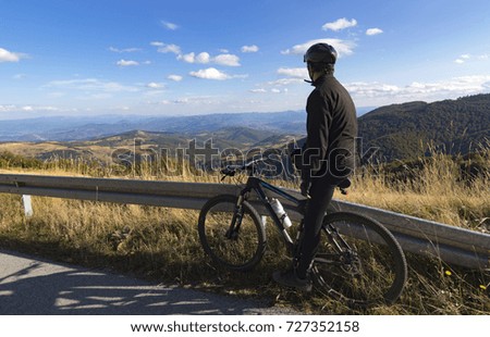 Cyclist on the mountain road.