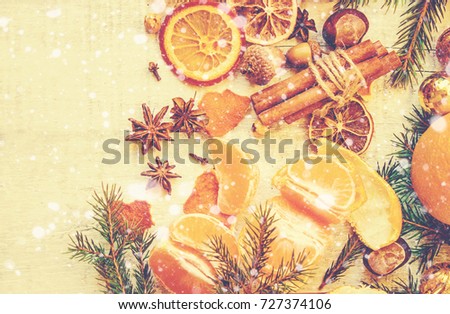 Christmas background with tangerines. Selective focus. 
