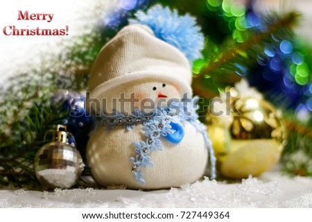snowman handmade. New Year background. inscription Happy Christmas.