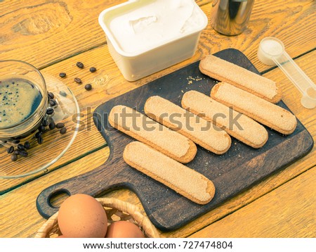 Image on top of cookie on cutting board, eggs