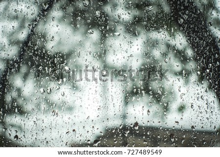 Rain drops on window glasses surface with Natural Pattern.