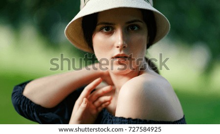 Portrait of woman with hat