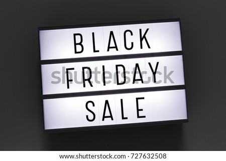 Black friday sale word on lightbox on dark gray background