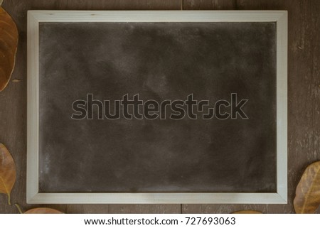 Abstract chalk blackboard with wood border frame ready used as background for add text or graphic , Tone design in Brown vintage style