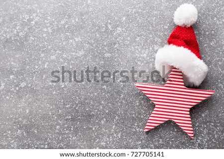 Vintage wooden christmas decor on the snow background.
