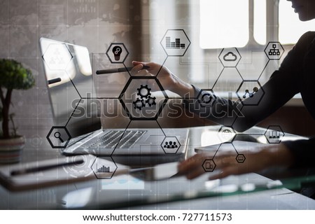 IOT and Automation concept as an innovation, improving productivity, reliability and repeatability in technology and business processes. Royalty-Free Stock Photo #727711573