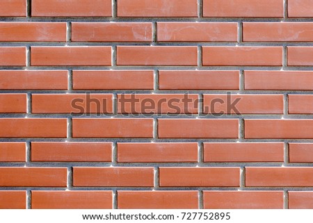 the red brick wallpaper background .the texture of red brick wall