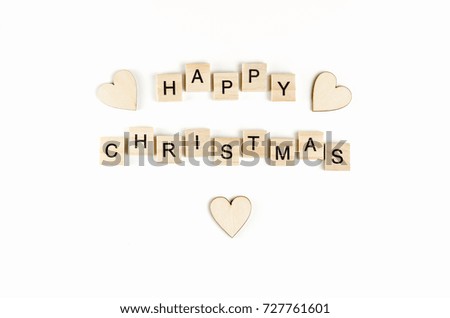 Happy christmas wooden text on a white background