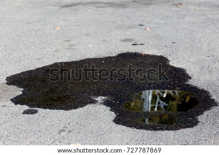 Oil on the asphalt Royalty-Free Stock Photo #727787869