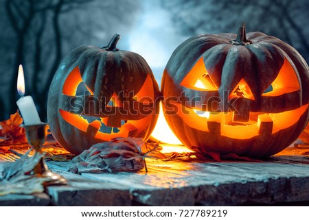 Halloween pumpkins on blue background