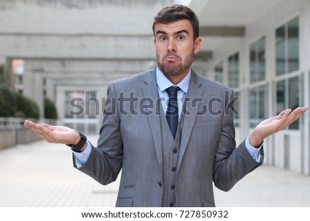 Mendacious businessman expression misunderstanding and confusion Royalty-Free Stock Photo #727850932