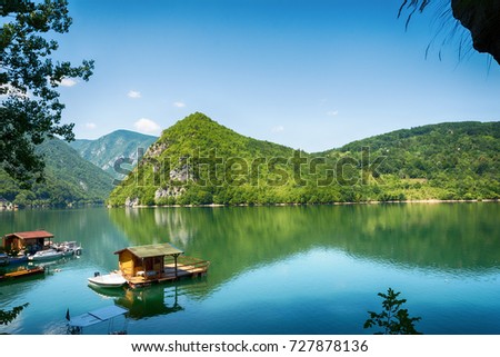 Perucac, Serbia July 31, 2017: Houseboats of Perucac lake, Tara National Park (Serbia)  Royalty-Free Stock Photo #727878136