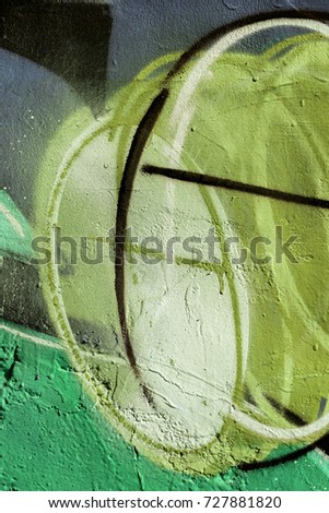 Art under ground. Beautiful street art graffiti style. The wall is decorated with abstract drawings house paint. Modern iconic urban culture of street youth. Abstract stylish picture graffiti on wall