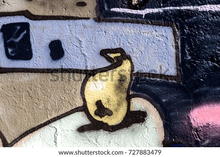 Art under ground. Beautiful street art graffiti style. The wall is decorated with abstract drawings house paint. Modern iconic urban culture of street youth. Abstract stylish picture graffiti on wall