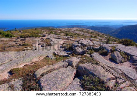 Top of the Cadillac Peak with fall foliage in Acadia National Park, Maine ME, USA.