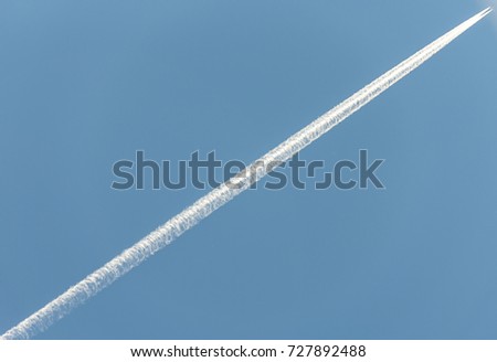 trail of high altitude plane