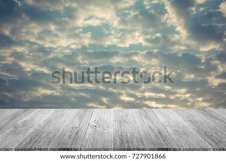 Nature cloudscape with red sky and white cloud with Wood terrace , process in vintage style