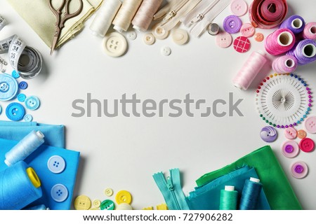 Composition with threads and sewing accessories on white background Royalty-Free Stock Photo #727906282