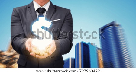 Businessman hold dollar currency symbol and modern city : Business economic financial concept