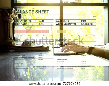 The picture of balance sheet on workspace background. financial management concept