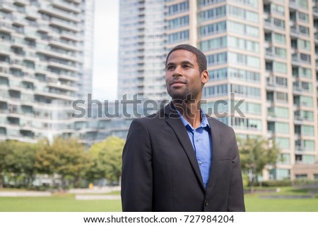 Modern African American business man in suits, photographed in NYC in September 2017