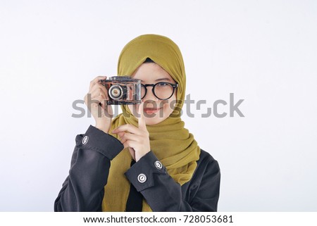 hijab ladies with camera at white backgroud