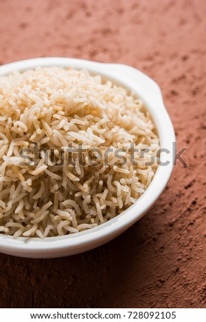 Stock Photo of cooked Brown Basmati rice served in a bowl, selective focus